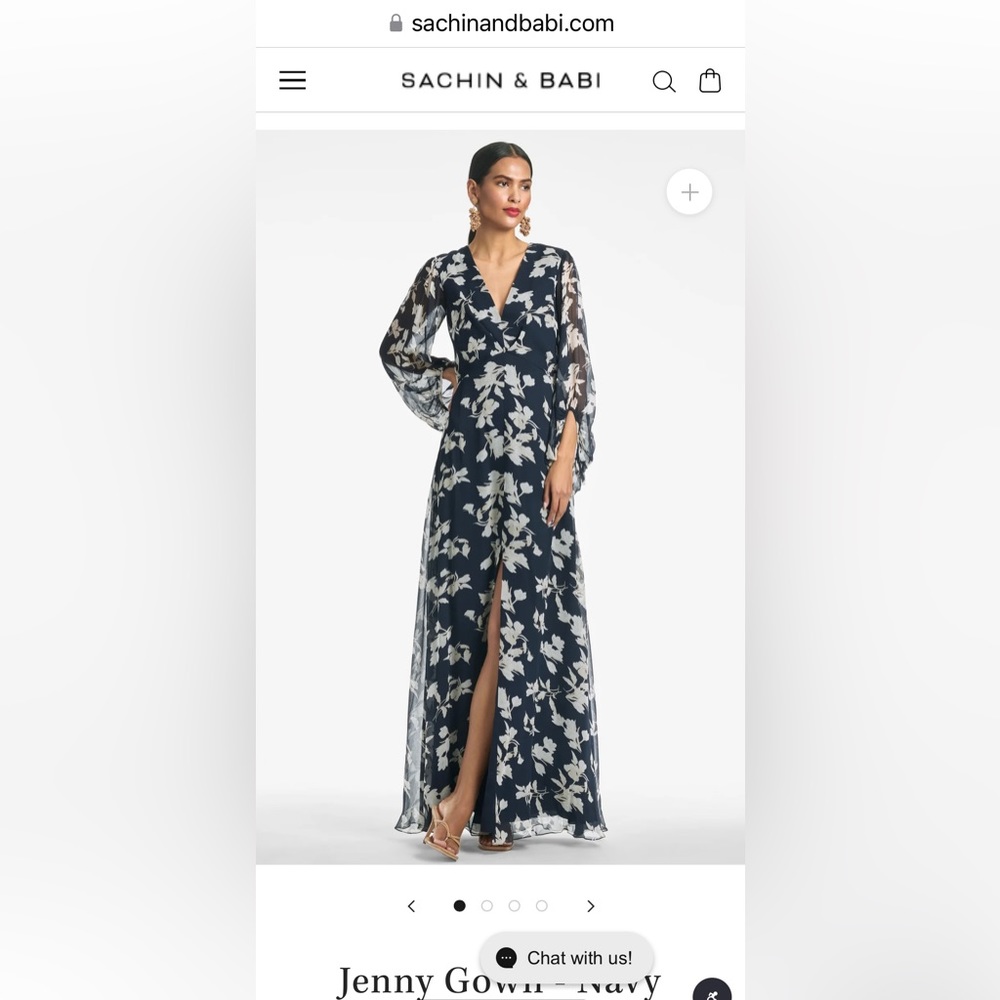 the empire waist gown falls to a perfect a-line, and the crescent sleeves